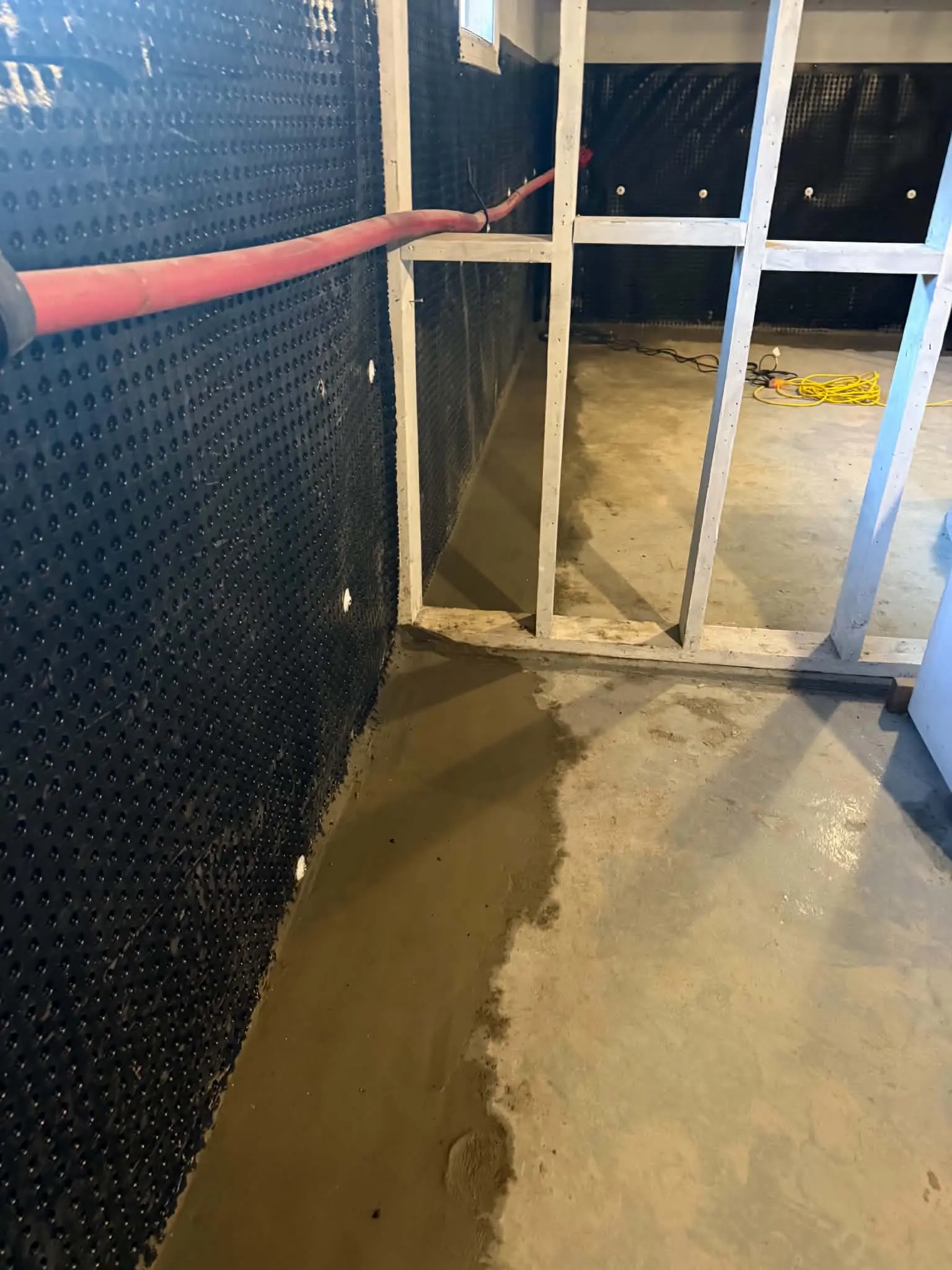 Dryshield interior basement waterproofing installation in a Windsor area home with sub-floor drainage